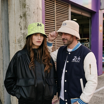 Man and woman wearing a 24H Le Mans bucket hat 